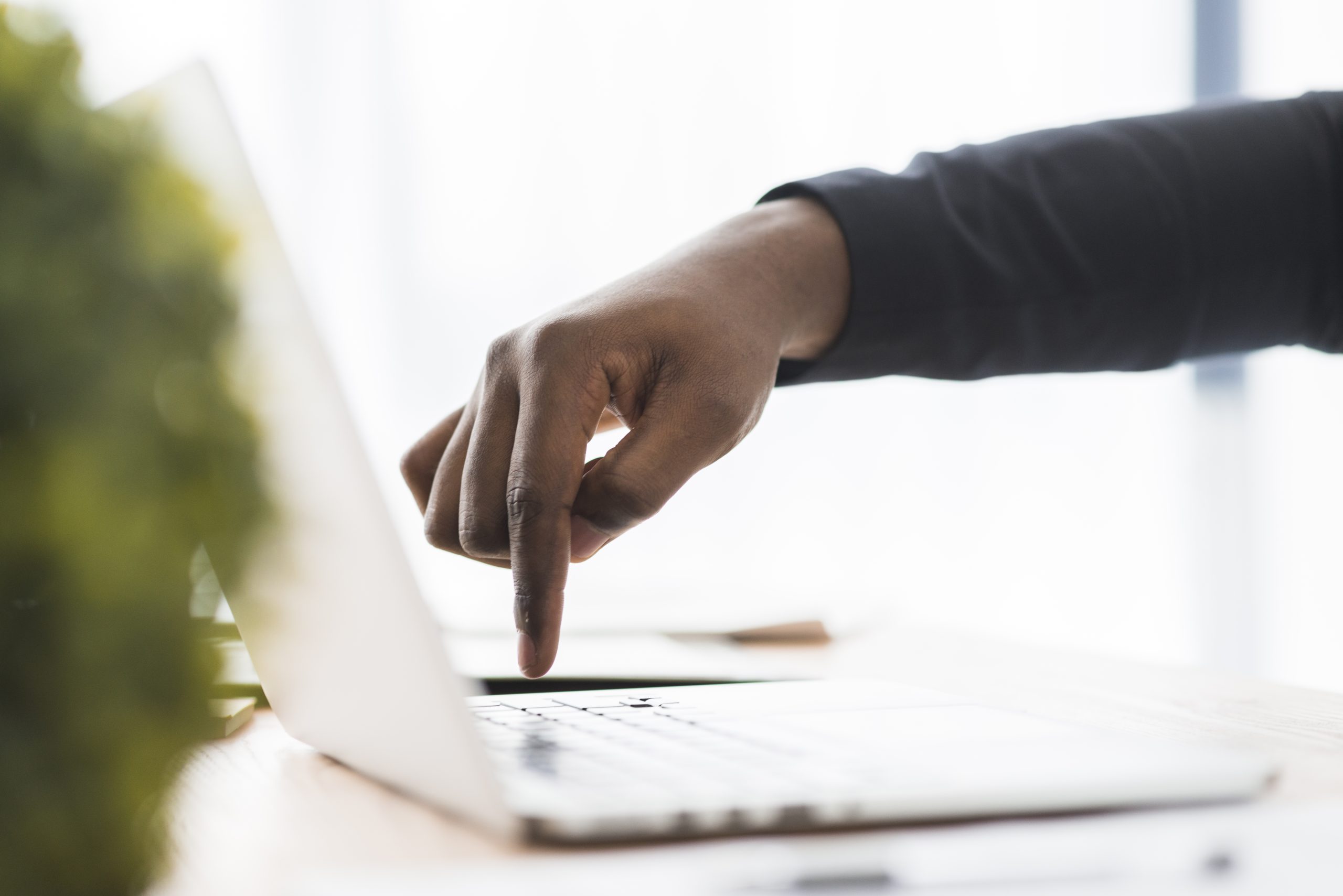 Person pressing keyboard keys